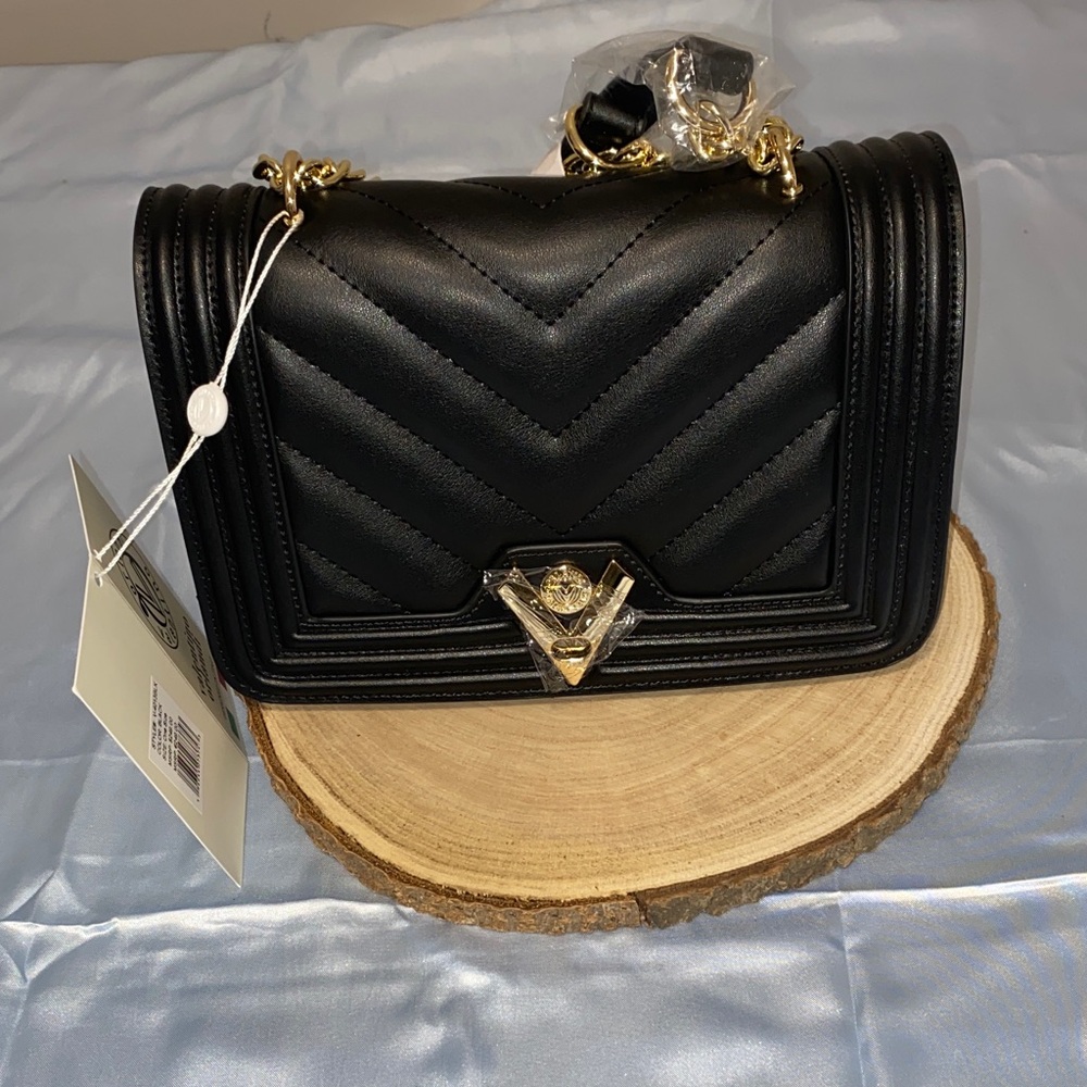 VALENTINO ORLANDI BLACK   QUILTED CROSSBODY 

It's not original.